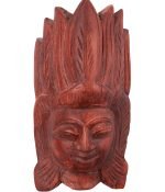 Wooden carved Sri Lankan mask isolated on white